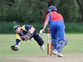 Jamie Kerr takes a diving catch to dismiss Craig.jpg